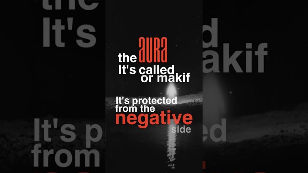 Vertical poster with red 'aura' text and white slogan on a dark space/landscape background; reads 'the aura It's called or makif' and 'It's protected from the negative side'.