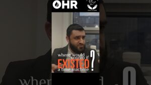 Bearded man in a suit speaking on a video thumbnail; overlay text asks about a time machine with 'EXISTED' in orange and OHR logo at top.