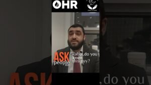 Bearded man in a suit speaking in an interview frame; overlaid text reads 'Rabbi, do you know this guy?' with 'ASK people me' graphic and OHR logo at the top.