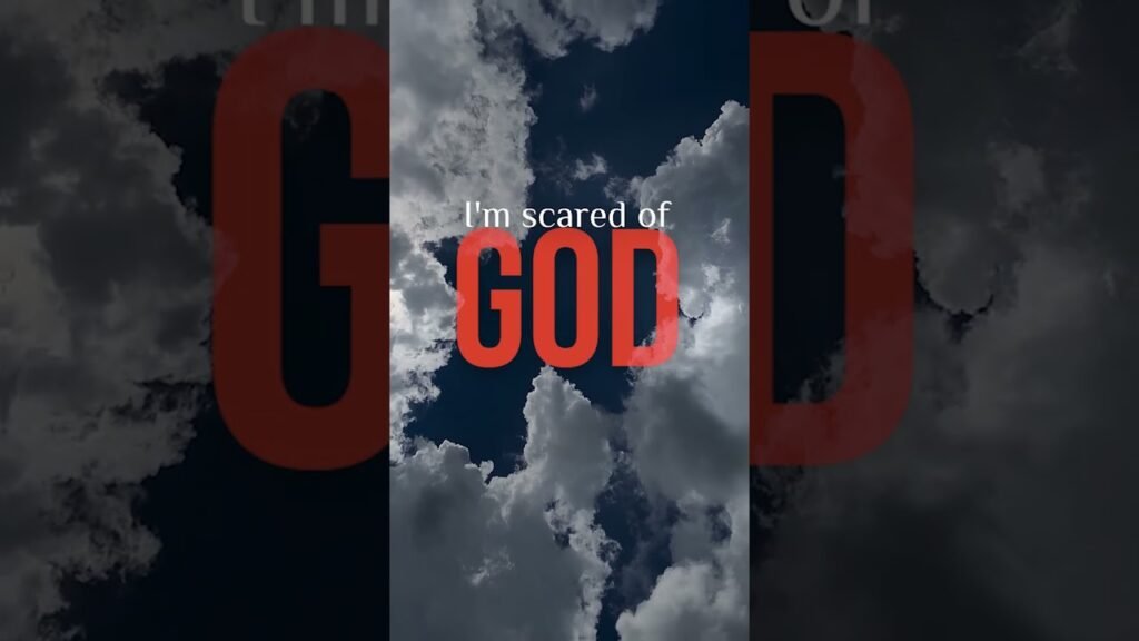 Poster-style graphic with a dramatic cloudy sky and bold red 'GOD' text; phrase: "I'm scared of GOD" in white above.