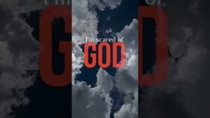 Poster-style graphic with a dramatic cloudy sky and bold red 'GOD' text; phrase: "I'm scared of GOD" in white above.